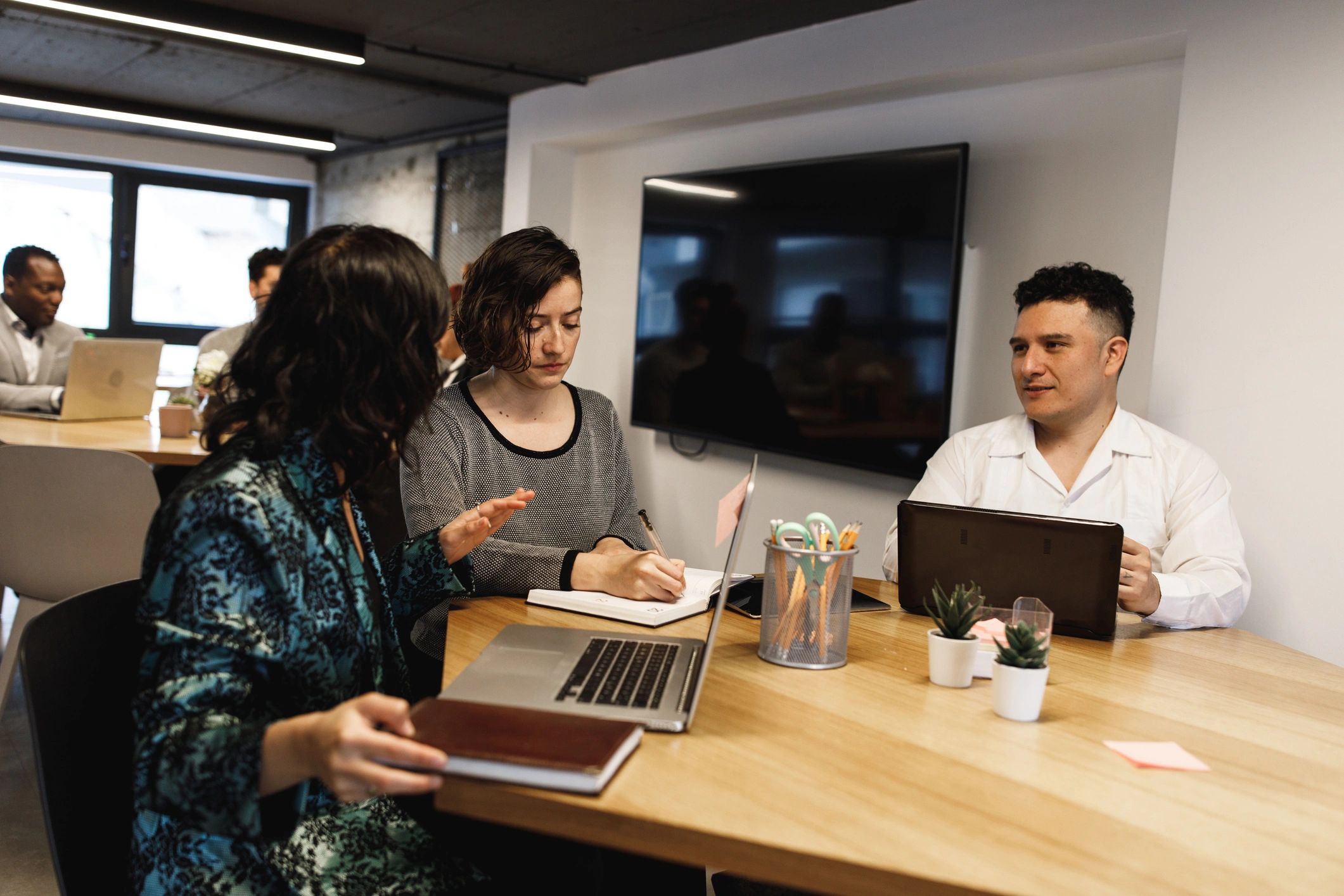 Diverse team members developing diverse business strategies