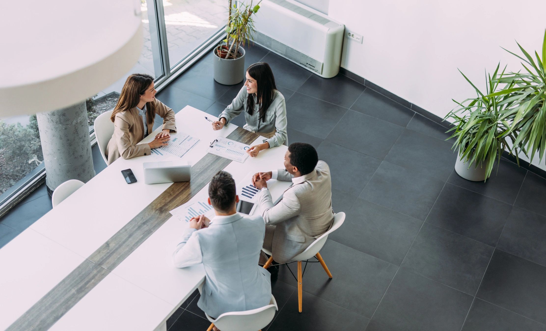 Business team in a meeting representing client success