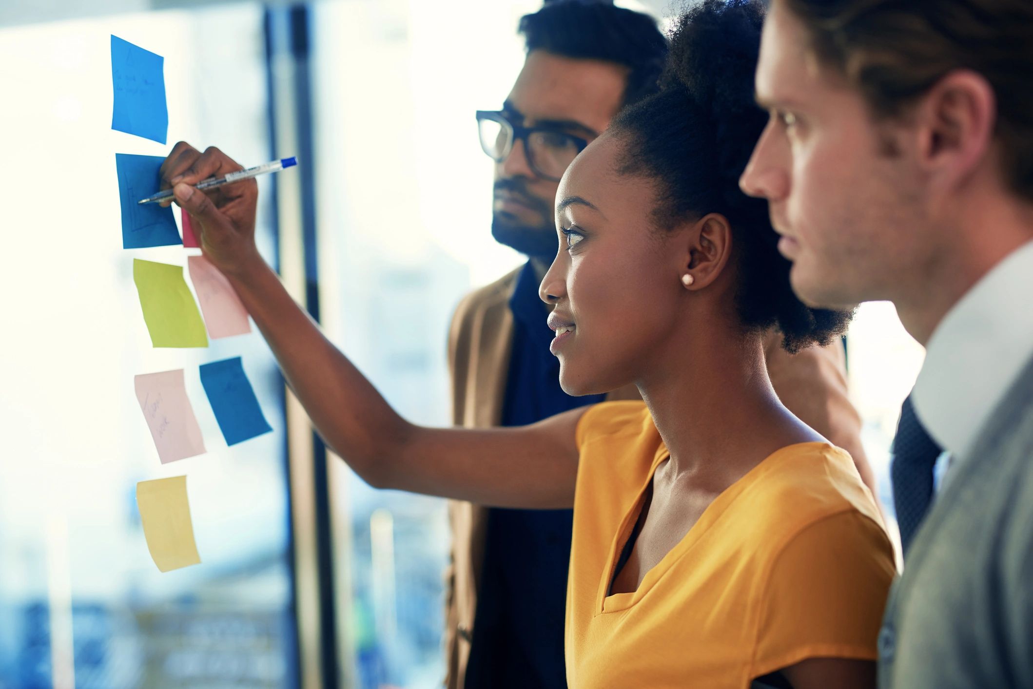 Team collaborating on growth strategy in a modern office