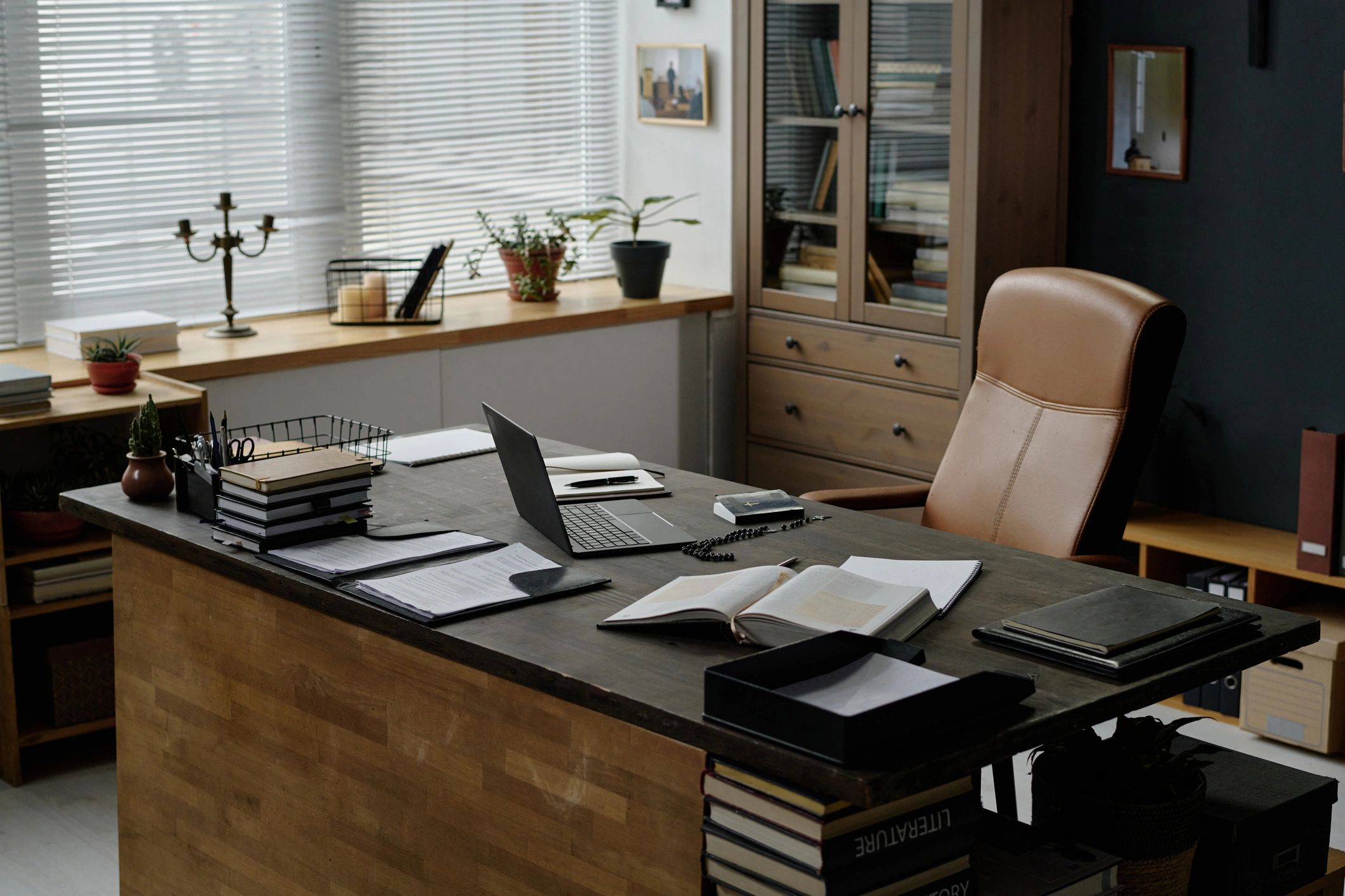Desk with laptop representing billing and agreement review